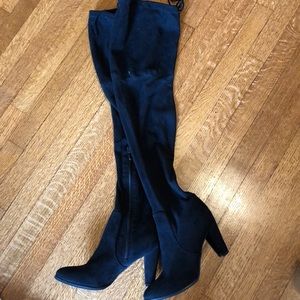 Thigh high black boots